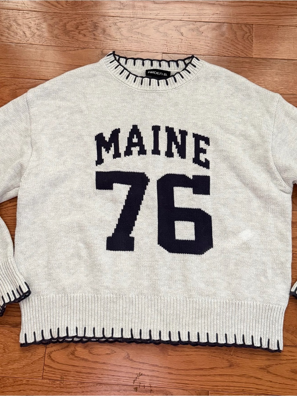Ardene Cream Crewneck Sweater with Black 'MAINE 76' Graphic